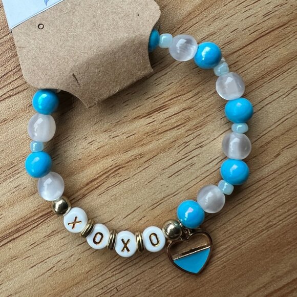 Blue and White Glass Beaded Stretchy Bracelet with Gold Accents, Heart Charm - Picture 2 of 2